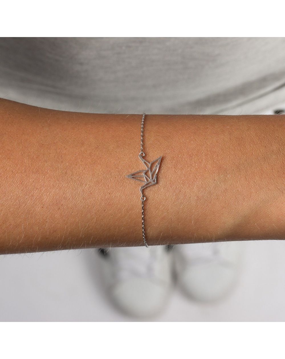 Bracelet 7bis origami oiseau argenté sur mannequin